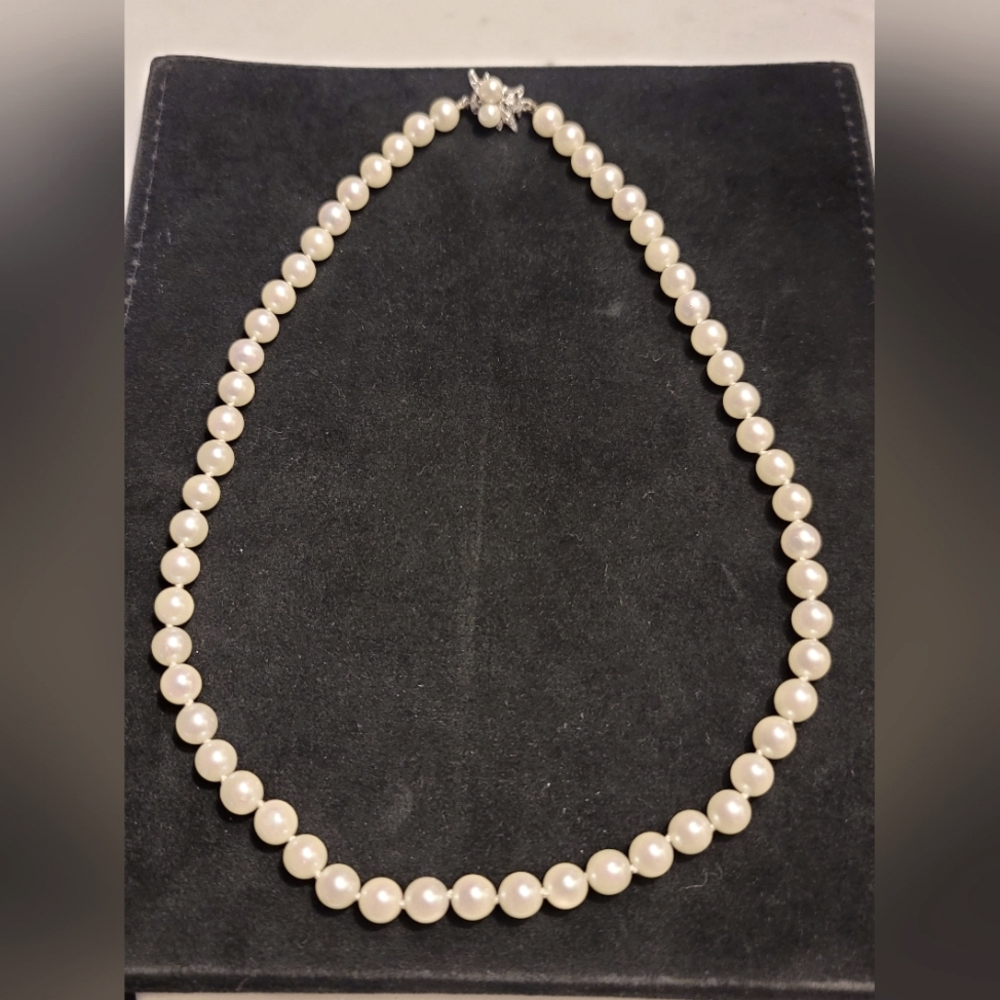 17.5" String of 7mm diameter Cultured Pearls with beautiful white gold clasp